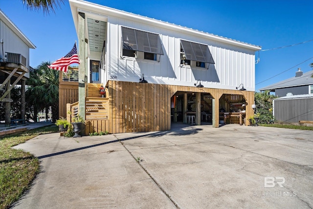 view of front of property with a carport