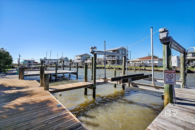 dock area with a water view