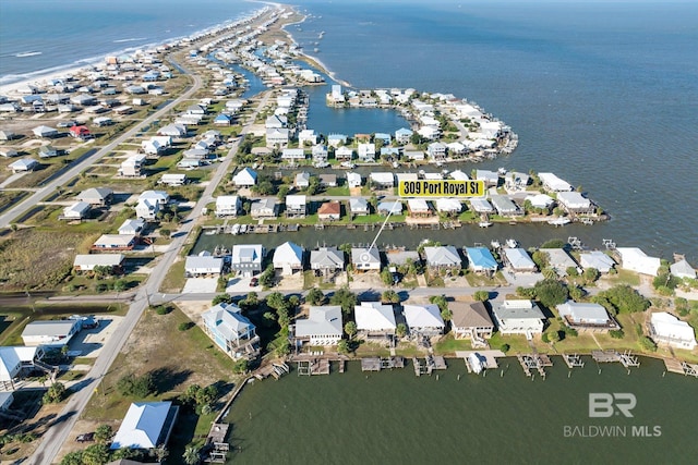 drone / aerial view with a water view