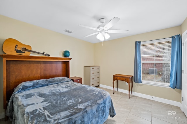bedroom with ceiling fan and light tile patterned flooring
