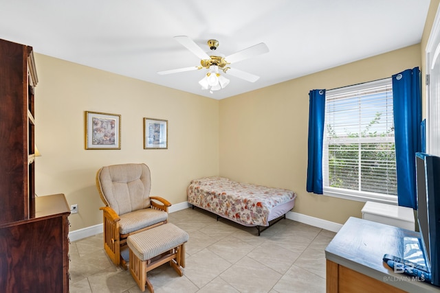 tiled bedroom with ceiling fan