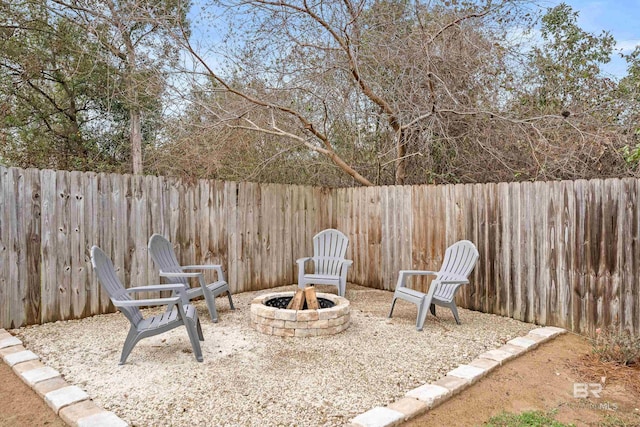 view of patio featuring a fire pit