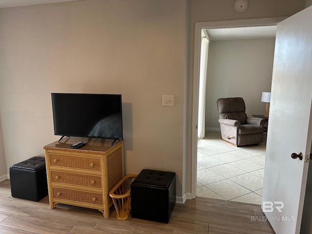 633 W Beach Blvd Unit 303, Gulf Shores, AL 36542 - hallway with wood tiled floors and baseboards