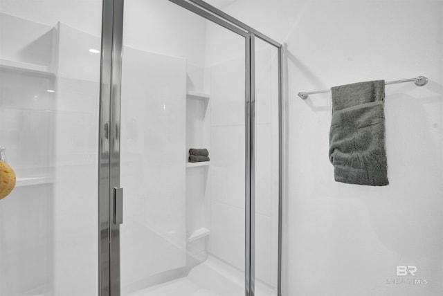 bathroom featuring a shower stall