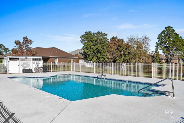 view of pool featuring a patio area