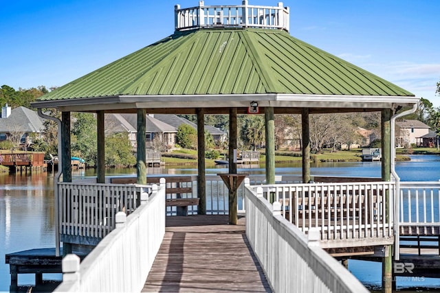 view of dock with a water view