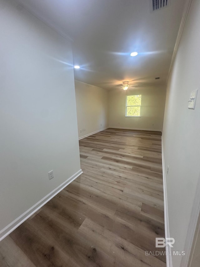 spare room featuring light hardwood / wood-style floors