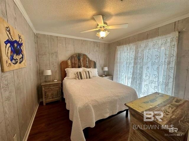 2800 W Beach Blvd, Gulf Shores, AL 36542 - bedroom featuring ornamental molding, baseboards, a textured ceiling, dark wood finished floors, and ceiling fan