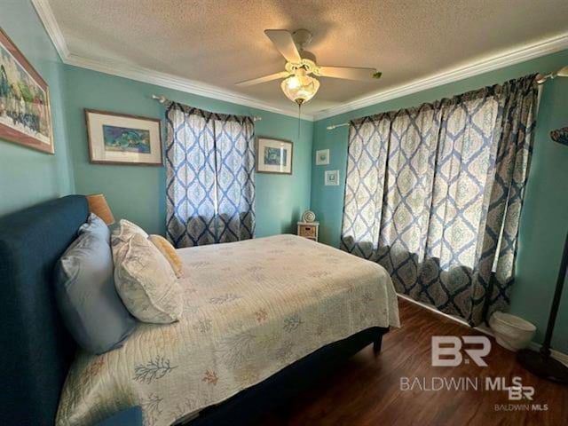 2800 W Beach Blvd, Gulf Shores, AL 36542 - bedroom featuring crown molding, wood finished floors, ceiling fan, and a textured ceiling