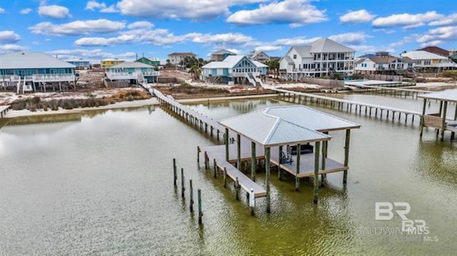 2800 W Beach Blvd, Gulf Shores, AL 36542 - view of dock featuring a water view and a residential view