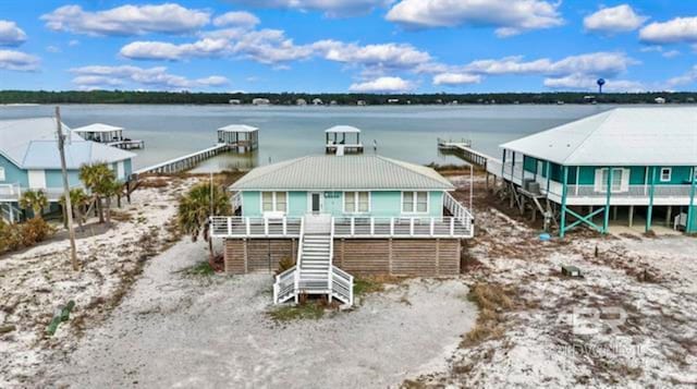 2800 W Beach Blvd, Gulf Shores, AL 36542 - rear view of property with a water view and stairway