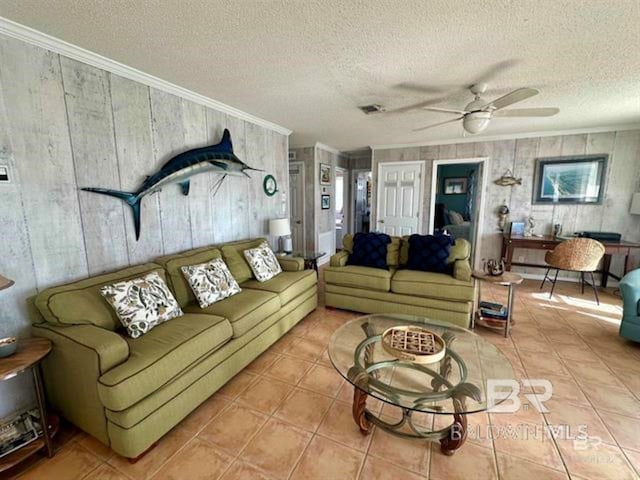 2800 W Beach Blvd, Gulf Shores, AL 36542 - living area featuring a textured ceiling, ornamental molding, tile patterned flooring, and ceiling fan