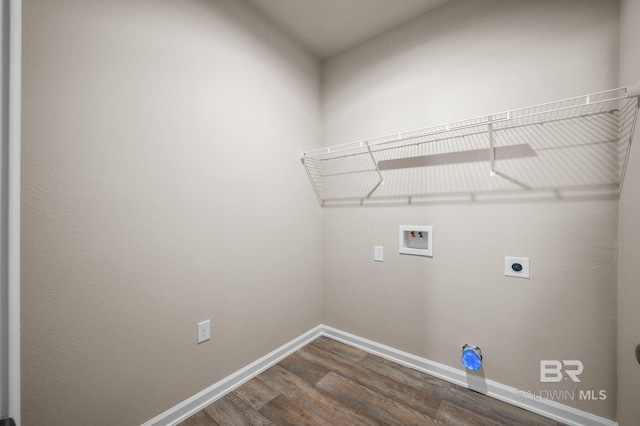 laundry room featuring dark wood-style floors, hookup for a washing machine, baseboards, and hookup for an electric dryer