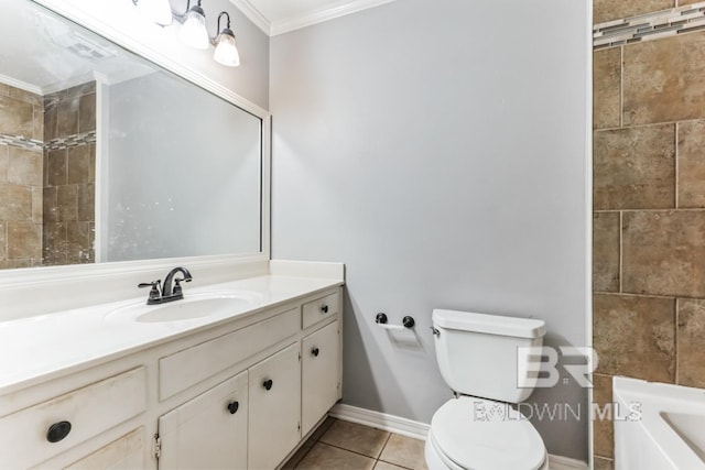 bathroom featuring a tub to relax in, toilet, ornamental molding, tile patterned flooring, and vanity