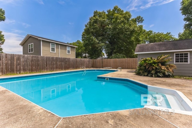 view of swimming pool with a fenced in pool and a fenced backyard