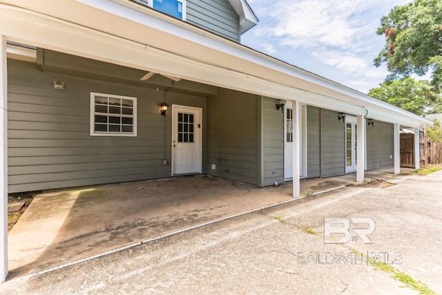 doorway to property featuring a patio