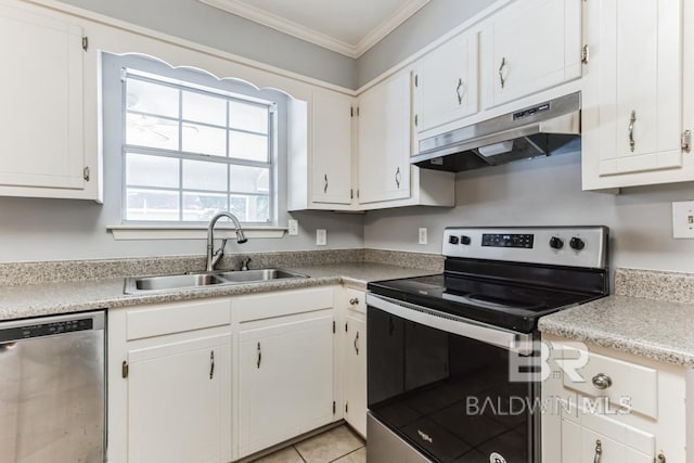 kitchen with crown molding, stainless steel appliances, white cabinets, a sink, and under cabinet range hood