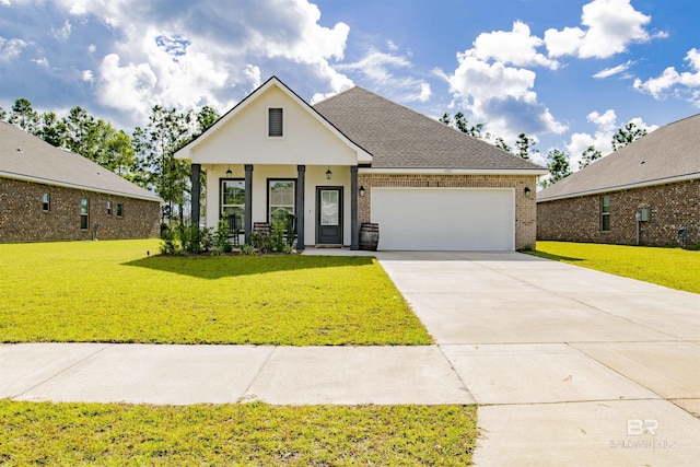 6902 Summerset Dr, Gulf Shores, AL 36542 - view of front of house featuring an attached garage, a front lawn, concrete driveway, and brick siding