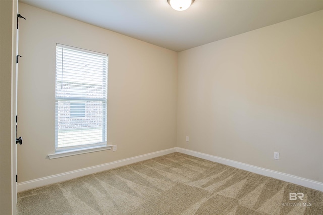 6902 Summerset Dr, Gulf Shores, AL 36542 - carpeted spare room featuring baseboards