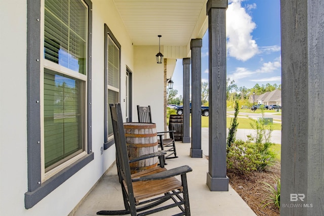 6902 Summerset Dr, Gulf Shores, AL 36542 - view of patio / terrace featuring covered porch