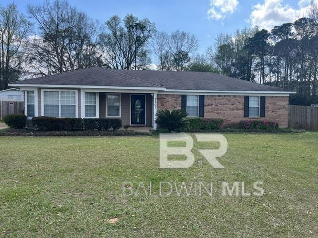 single story home featuring a front yard