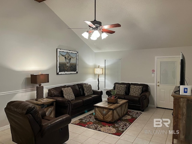 tiled living room with high vaulted ceiling, a textured ceiling, and ceiling fan