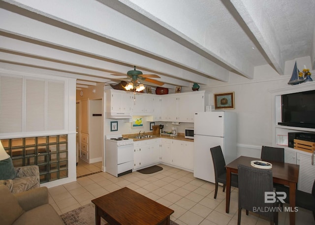 kitchen with beamed ceiling, white cabinetry, sink, light tile patterned floors, and white appliances