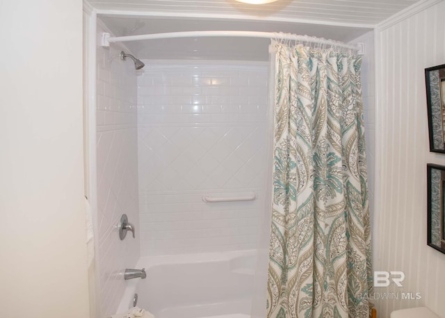 bathroom featuring shower / bathtub combination with curtain