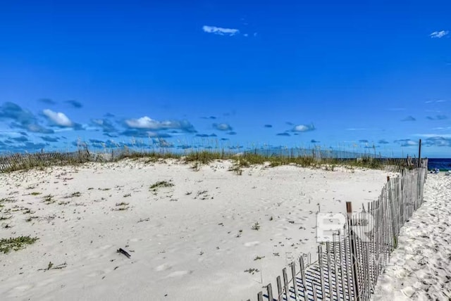 property view of water with a beach view