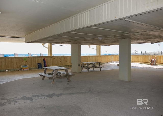 view of patio featuring a water view