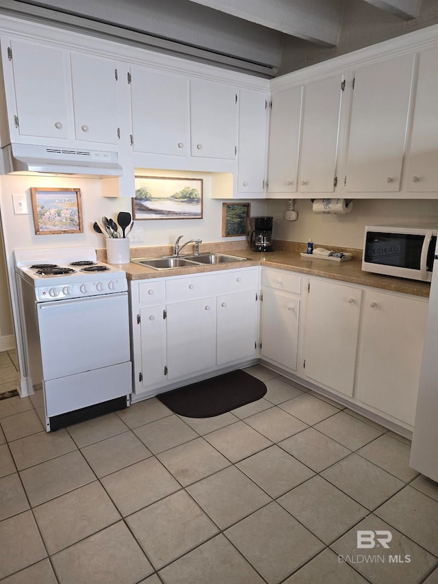 kitchen with white cabinetry, sink, and white appliances