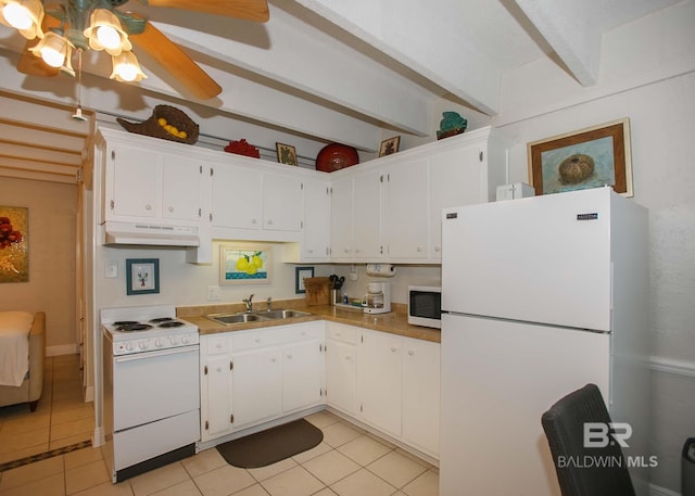 kitchen with white appliances, light tile patterned floors, sink, and white cabinets