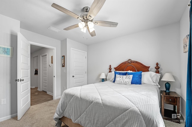 20770 Mercury Dr, Robertsdale, AL 36567 - bedroom with carpet flooring, a ceiling fan, and a closet