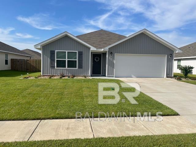 20770 Mercury Dr, Robertsdale, AL 36567 - ranch-style home with an attached garage, concrete driveway, and a shingled roof