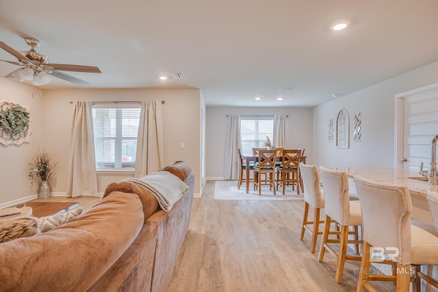 8242 Sycamore Way, Semmes, AL 36575 - living room with light wood-style floors, a ceiling fan, and recessed lighting