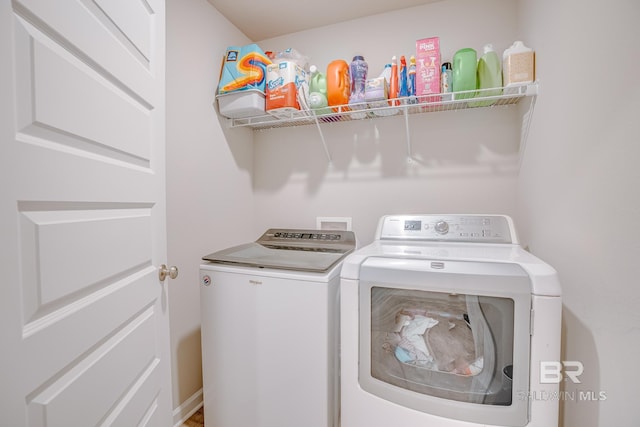 8242 Sycamore Way, Semmes, AL 36575 - laundry area featuring washing machine and clothes dryer