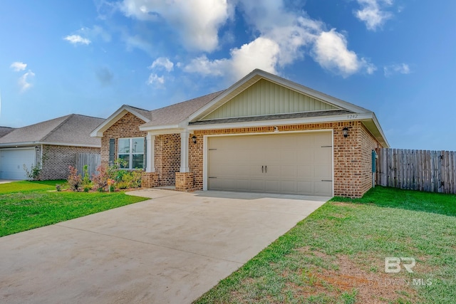 8242 Sycamore Way, Semmes, AL 36575 - view of front of home with brick siding, a garage, concrete driveway, board and batten siding, and a shingled roof