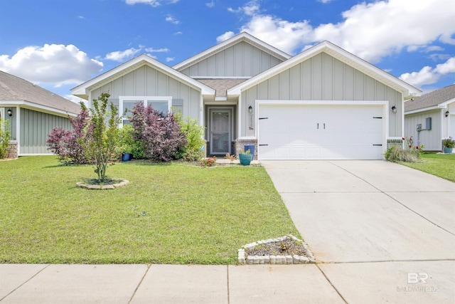 view of front of home with a garage and a front lawn