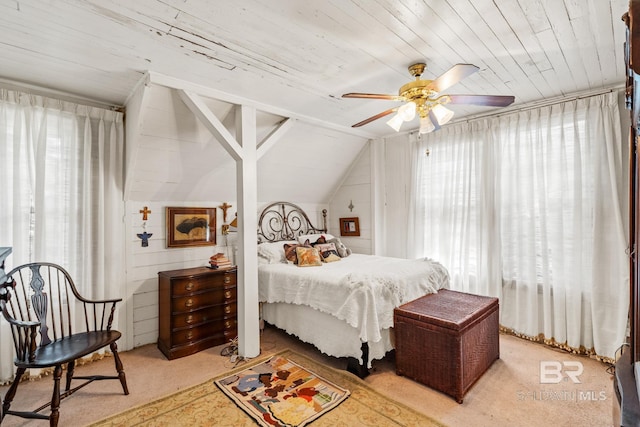 bedroom with ceiling fan, wood ceiling, lofted ceiling, and light carpet