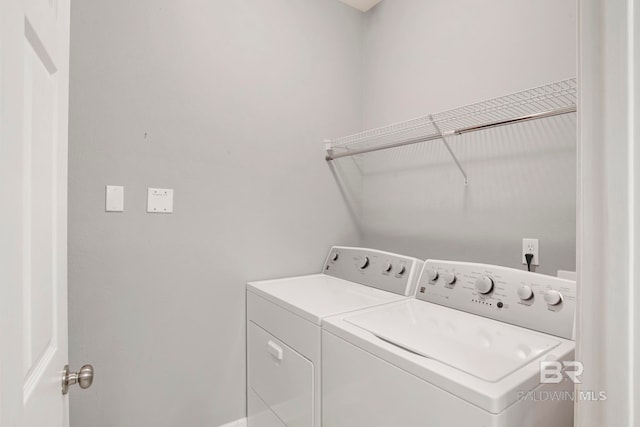 laundry area featuring independent washer and dryer