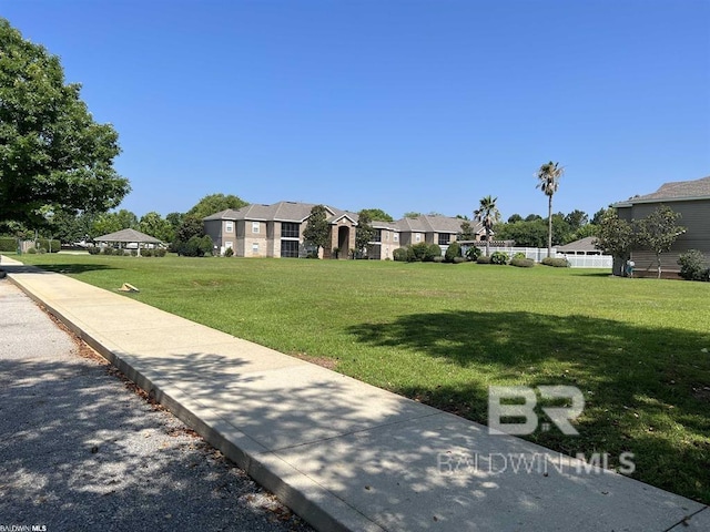 exterior space with a lawn