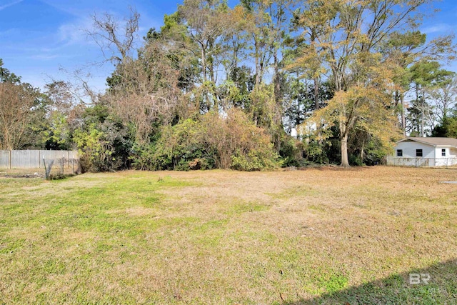 view of yard with fence