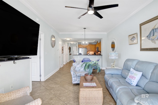 tiled living room featuring crown molding and ceiling fan with notable chandelier