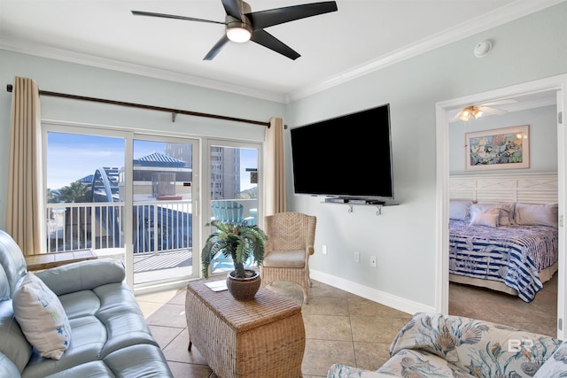 tiled living room featuring ceiling fan and crown molding