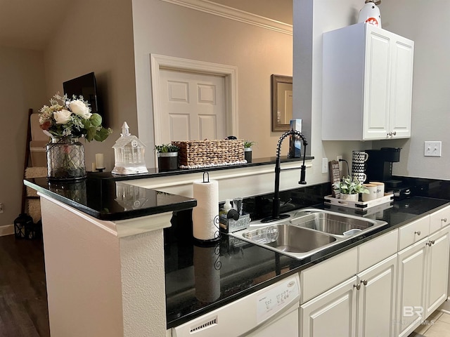 kitchen with sink, crown molding, dishwasher, white cabinetry, and kitchen peninsula