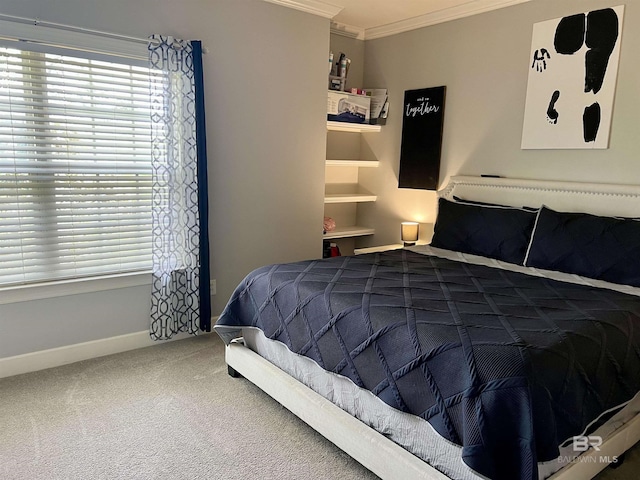 carpeted bedroom with crown molding