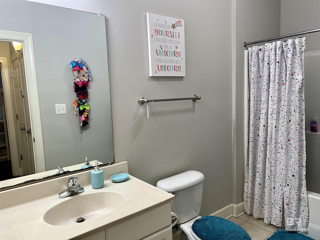 full bathroom featuring vanity, tile patterned floors, shower / bath combo with shower curtain, and toilet