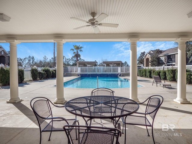 view of pool featuring a patio and ceiling fan