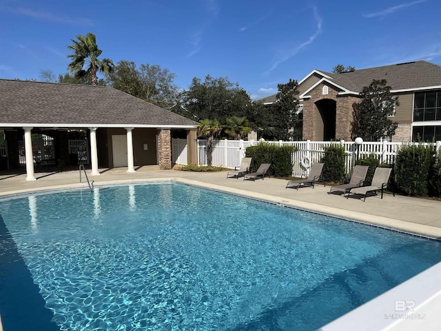 view of swimming pool featuring a patio area