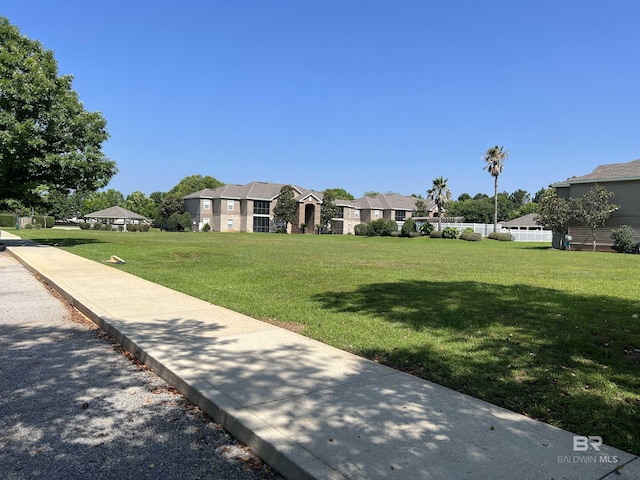 exterior space featuring a front lawn